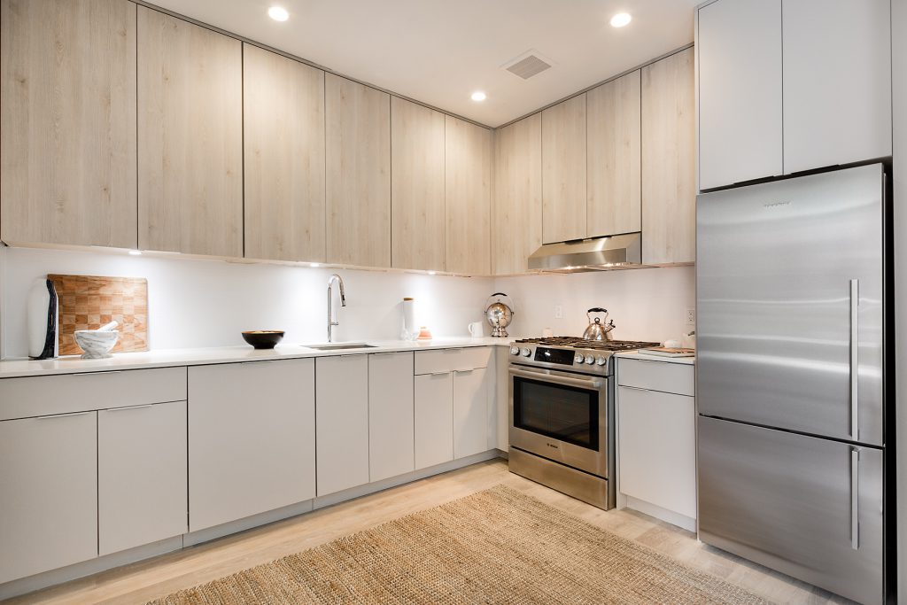 Modern Kitchen by Williamsburg Kitchens using Lioher products